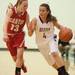 Dexter's Makeszie Svihra drives the ball down court against Canton's Natalie Winters during the first half the regional semifinal game at Novi High School Tuesday, Mar. 5th.
Courtney Sacco I AnnArbor.com  